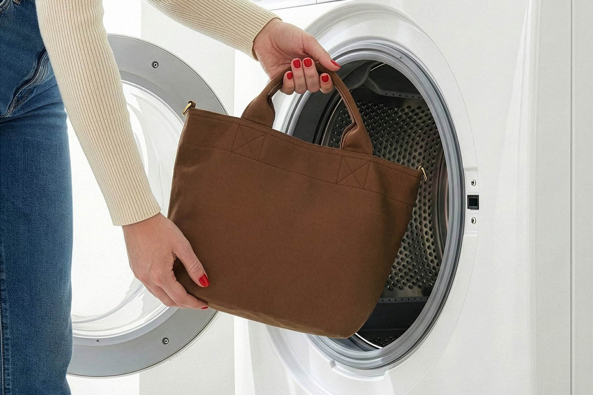 Loading a Canvelle Zip Crossbody Tote into a front-load washing machine