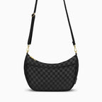 Canvelle Crescent Bag in medium black checkered canvas with gold hardware – front view.