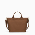 Canvelle Zip Crossbody Tote in medium brown recycled polyester canvas with gold hardware - Front view.