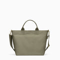 Canvelle Zip Crossbody Tote in medium olive green recycled polyester canvas with gold hardware - Front view.