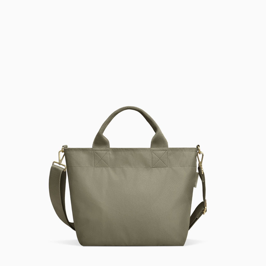 Canvelle Zip Crossbody Tote in small olive green recycled polyester canvas with gold hardware - Front view.