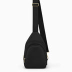 Canvelle City Sling Bag in small black recycled polyester canvas with gold hardware - Front view.