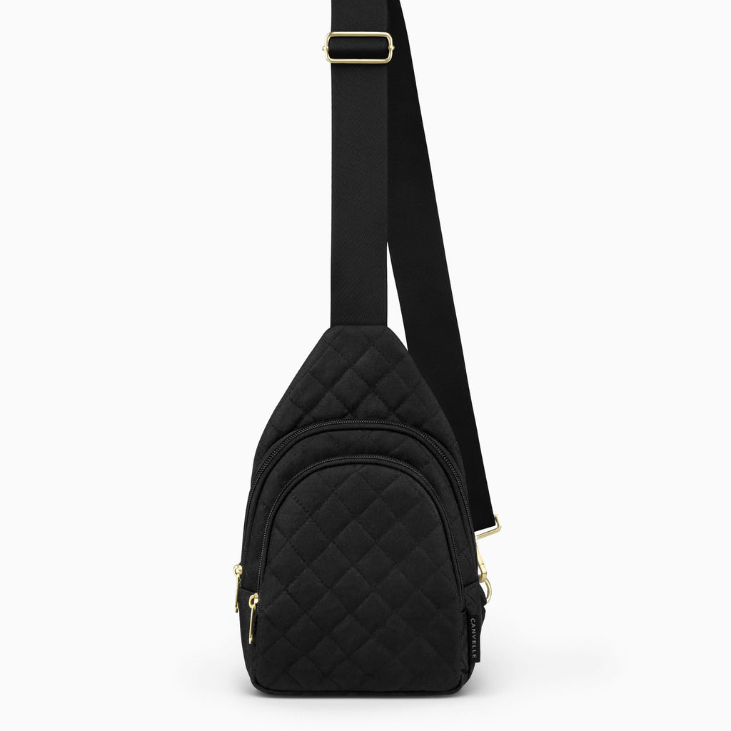 Canvelle City Sling Bag in small quilted black recycled polyester with gold hardware - Front view.