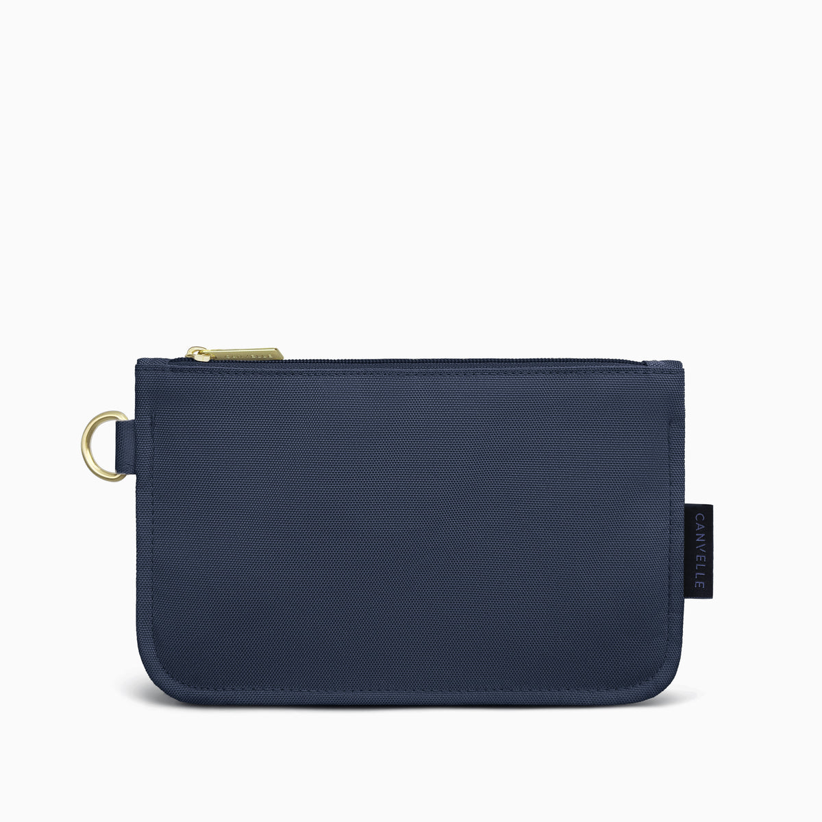 Canvelle Flat Pouch in medium navy canvas with gold hardware - Front view.