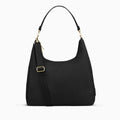 Canvelle Hobo Handbag in large black recycled polyester canvas with gold hardware - Front view with shoulder strap and tucked crossbody strap.