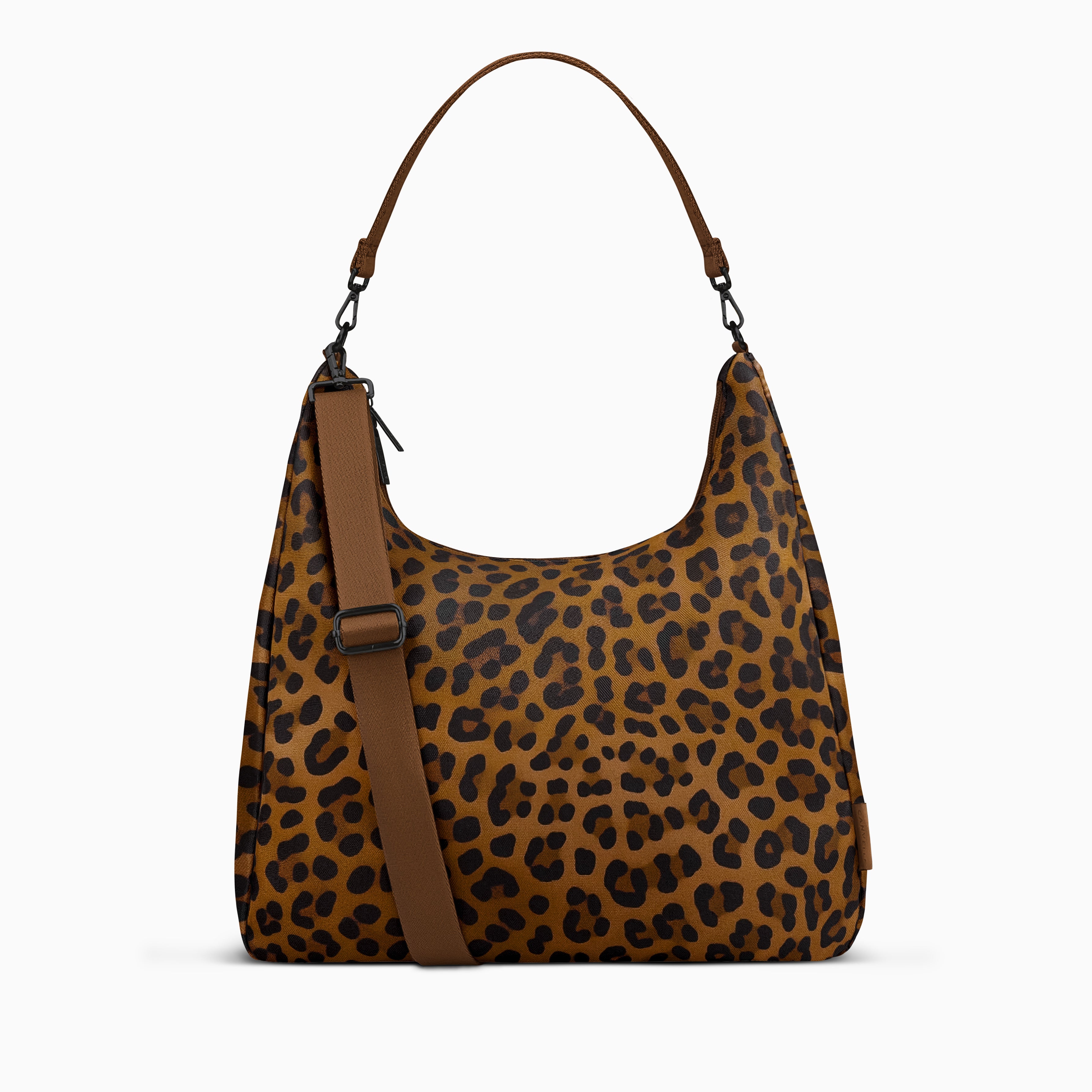 Canvelle Hobo Handbag in large brown leopard print recycled polyester canvas with black hardware - Front view with shoulder strap and tucked crossbody strap.