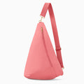 Oversized Canvelle Contour Sling Bag in pink recycled polyester canvas with gold hardware – front view.