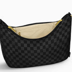 Open large black checkered Canvelle Hobo Handbag showing the interior zip pocket and wipeable water-resistant lining.