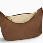 Open large brown Canvelle Hobo Handbag showing the interior zip pocket and wipeable water-resistant lining.
