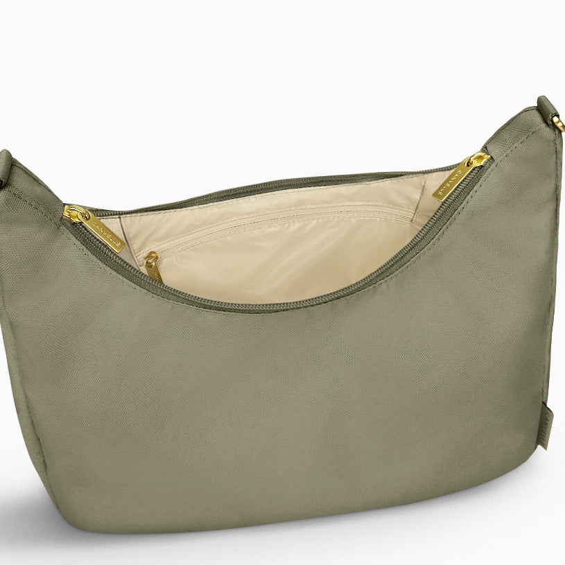 Open large olive Canvelle Hobo Handbag showing the interior zip pocket and wipeable water-resistant lining.