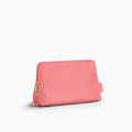 Canvelle Toiletry Bag in medium pink recycled polyester canvas with gold hardware - Front view.