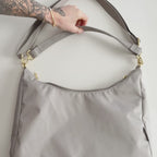 Product walkthrough of the medium grey Canvelle Hobo Handbag showing the interior and exterior pockets.